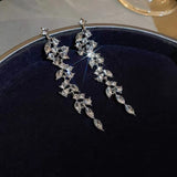 Elegant Crystal Leaf Drop Earrings – Silver-Tone Statement Jewelry